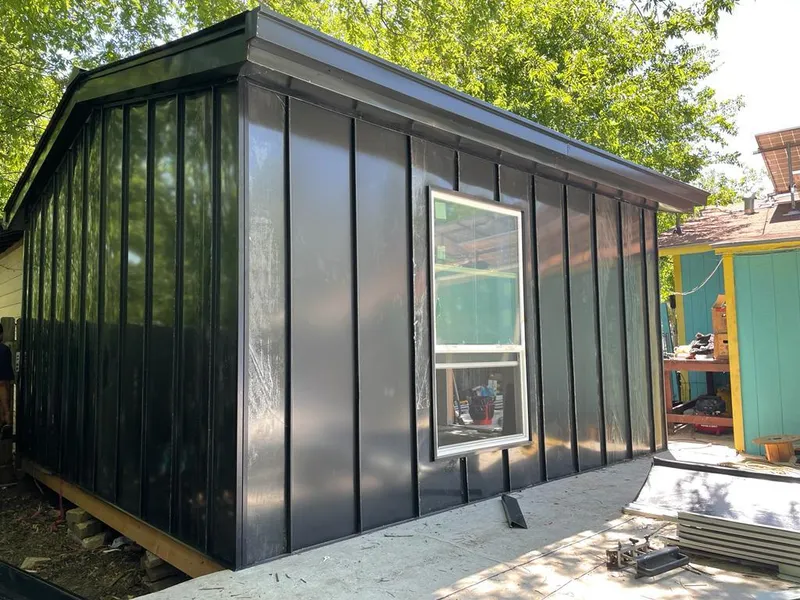 Black standing seam metal wall panels for Metal Roof Installation in Salem Lakes