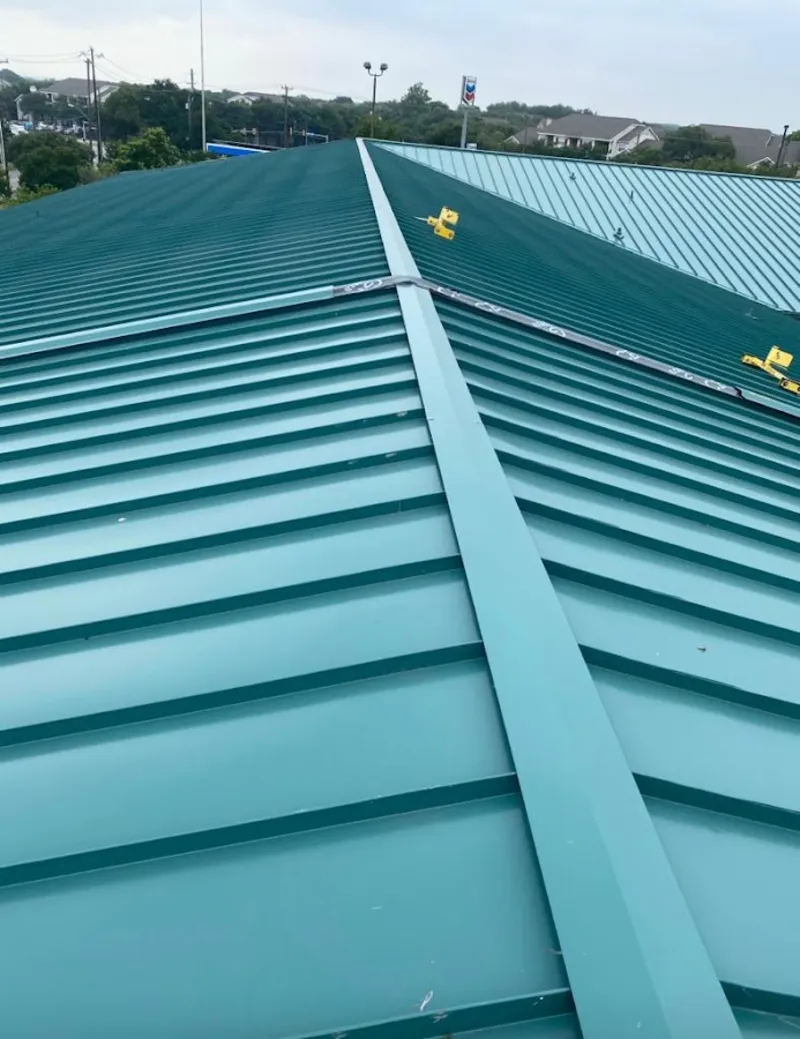 Green commercial metal roof ridge and valley for Metal Roof Repair in Salem Lakes